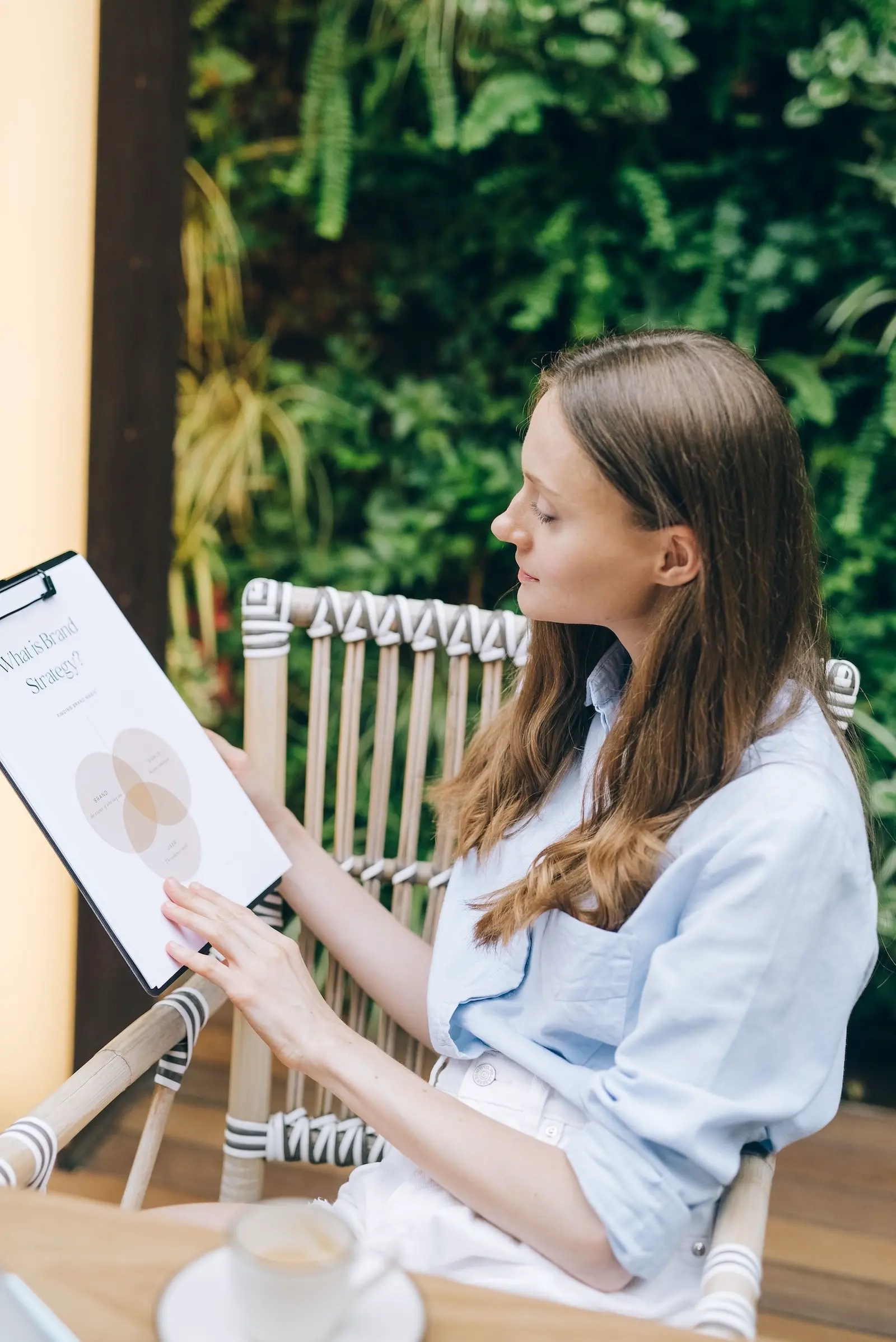 Claire reviewing a brand strategy sheet